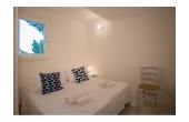Villa Eulimene - Casa vacanze sul mare a Villasimius in Sardegna - camera con letto matrimoniale.